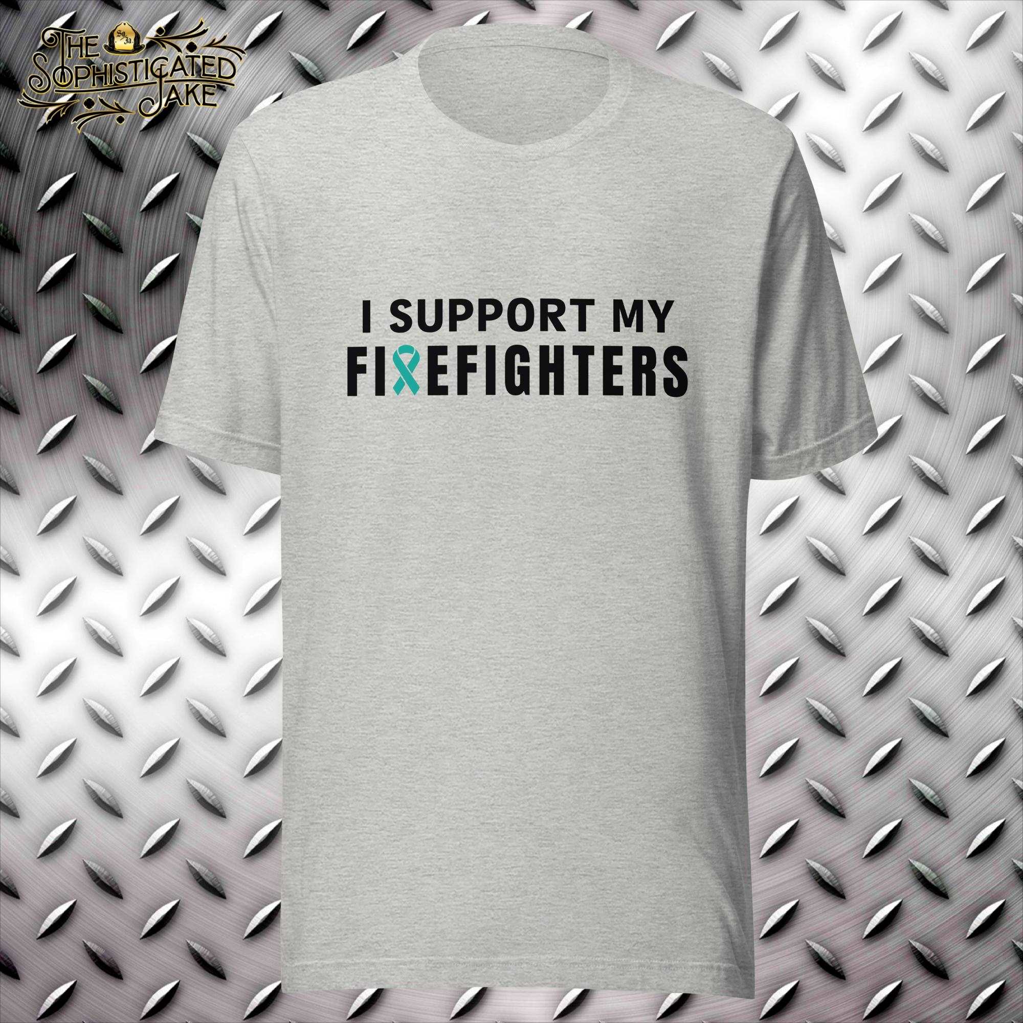 Grey t-shirt with design in the center of the chest reading, "I support my firefighters".  The "R" in Fire is replaced with a teal PTSD awareness ribbon.