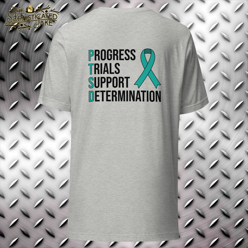 Grey t-shirt with the Sophisticated Jake logo on the front left breast and graphic on the back.  The back reads, 