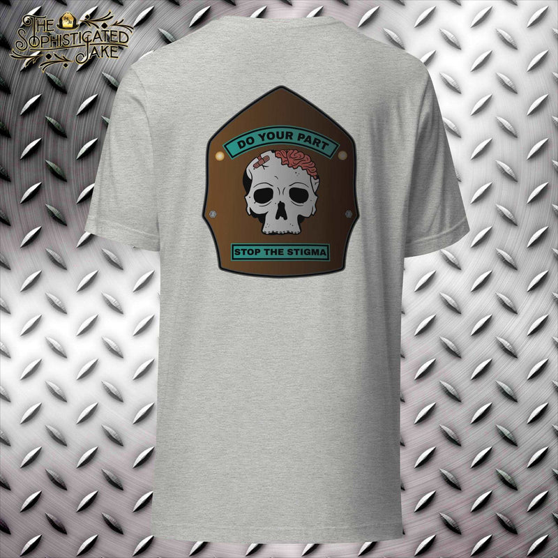Gray t-shirt with a brown firefighter helmet shield.  On the shield is a picture of a skull with bandaid on it and the caption do your part stop the stigma.